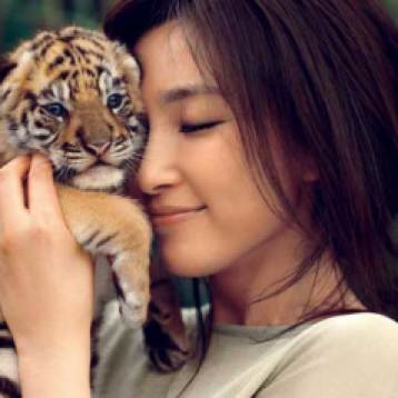 Holding Tiger Cub